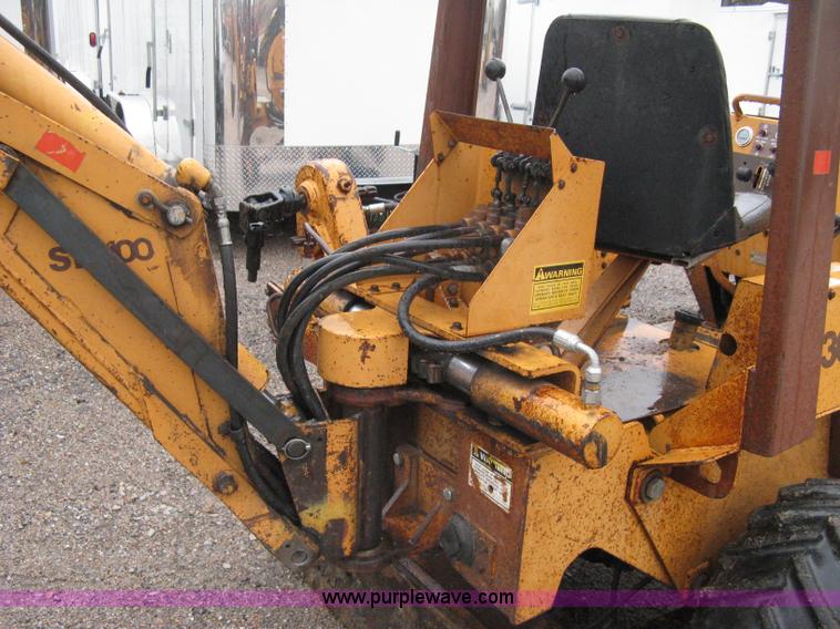 image for item A6015 Case 360 articulating trencher with backhoe attachment