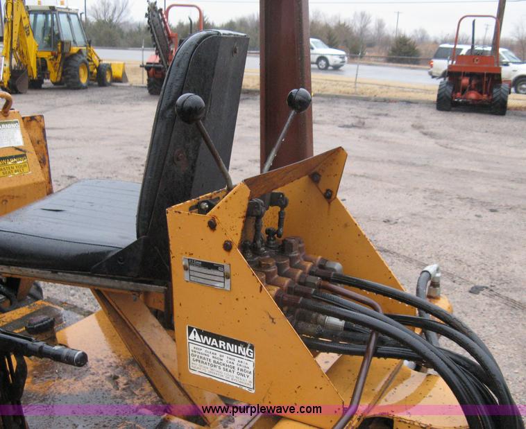 image for item A6015 Case 360 articulating trencher with backhoe attachment