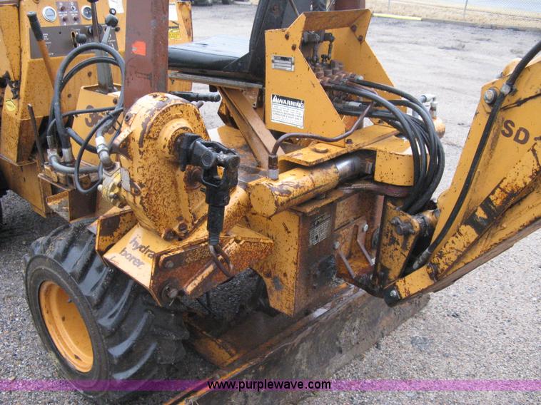 image for item A6015 Case 360 articulating trencher with backhoe attachment