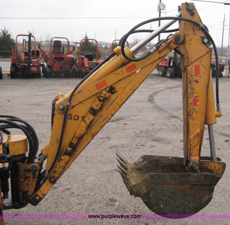 image for item A6015 Case 360 articulating trencher with backhoe attachment