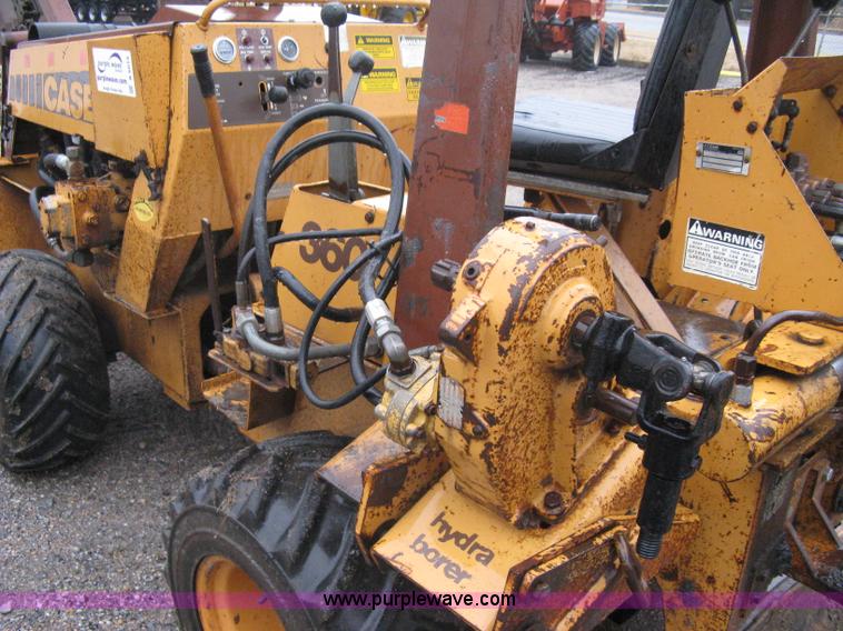image for item A6015 Case 360 articulating trencher with backhoe attachment