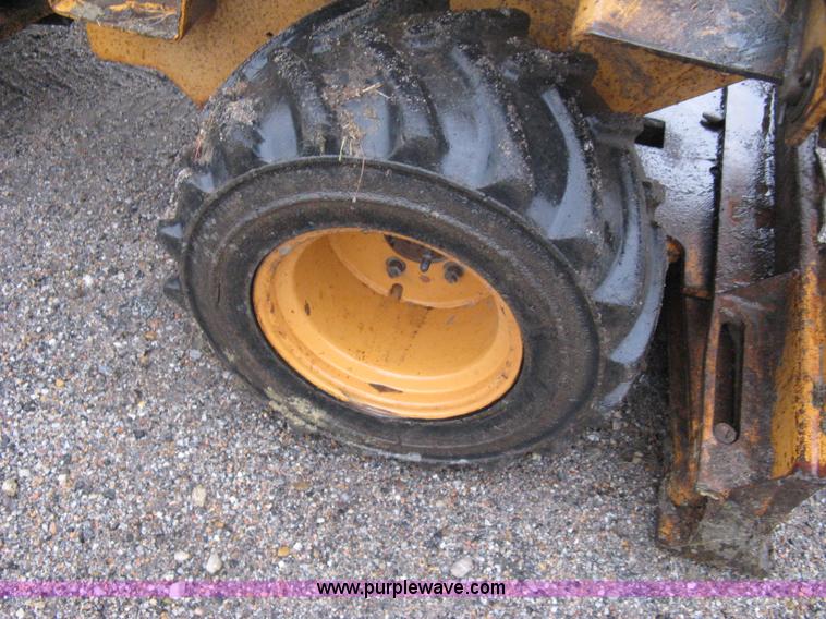 image for item A6015 Case 360 articulating trencher with backhoe attachment