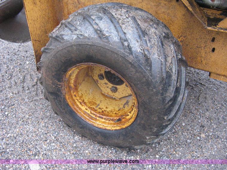 image for item A6015 Case 360 articulating trencher with backhoe attachment