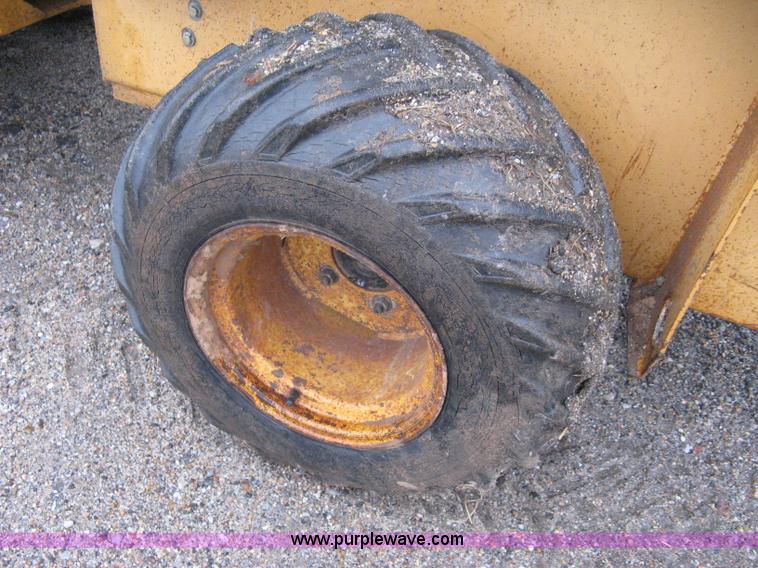 image for item A6015 Case 360 articulating trencher with backhoe attachment