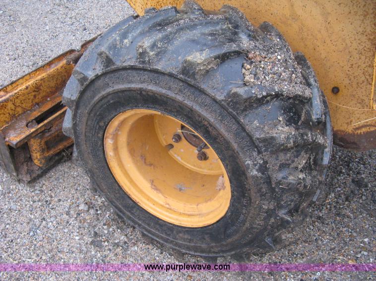 image for item A6015 Case 360 articulating trencher with backhoe attachment