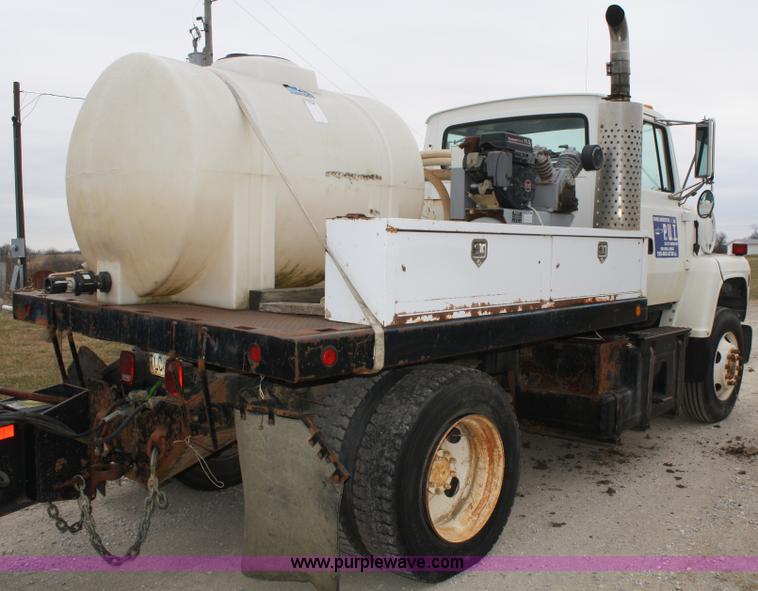 image for item A6599 1995 Ford L9000 flatbed truck