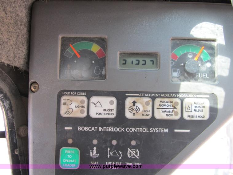 image for item B2556 2004 Bobcat T300 Turbo track skid steer