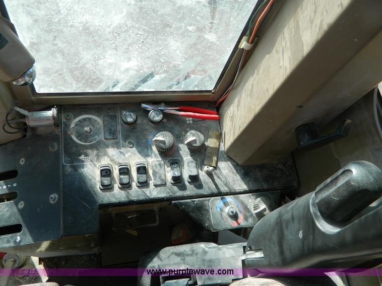 image for item D8659 1998 John Deere 770CH motor grader