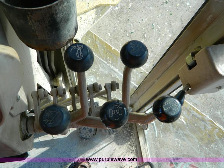 image for item D8659 1998 John Deere 770CH motor grader