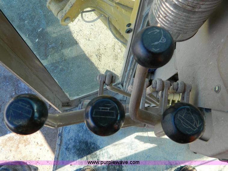 image for item D8659 1998 John Deere 770CH motor grader