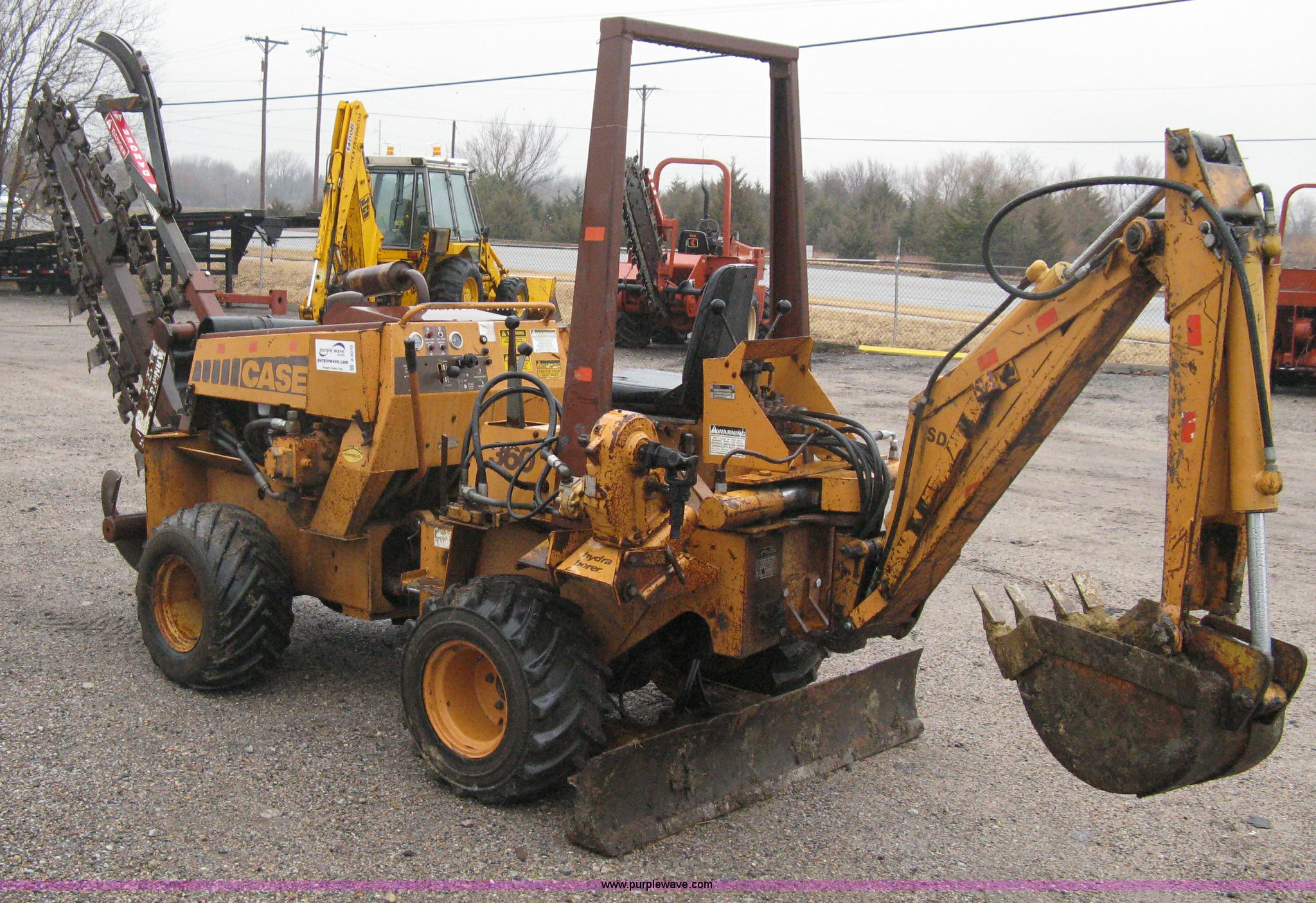 Case 360 articulating trencher with backhoe attachment in Wichita, KS
