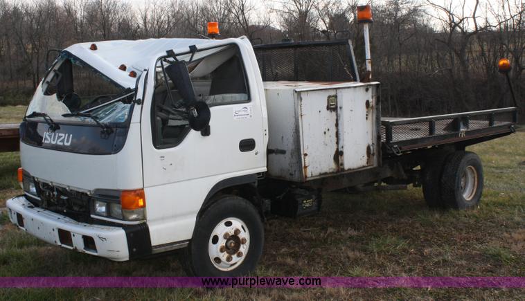 image for item A6612 1998 Isuzu NPR flatbed truck
