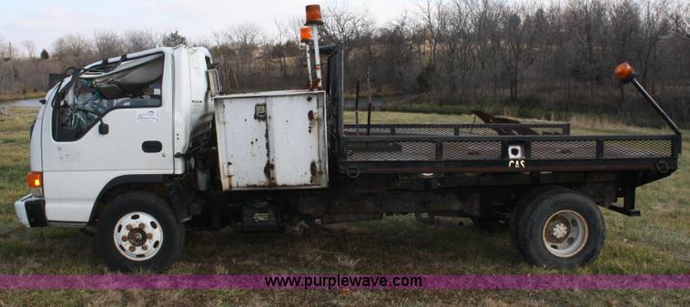 image for item A6612 1998 Isuzu NPR flatbed truck