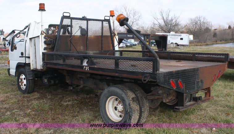 image for item A6612 1998 Isuzu NPR flatbed truck