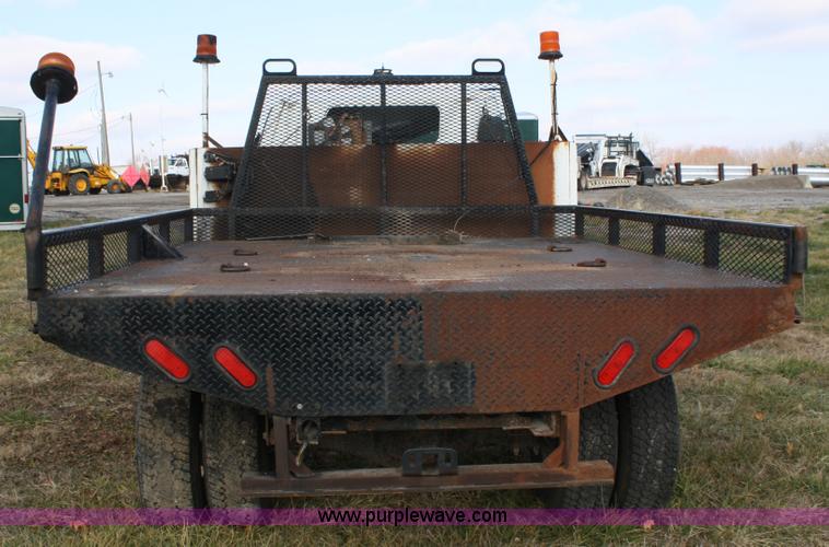 image for item A6612 1998 Isuzu NPR flatbed truck