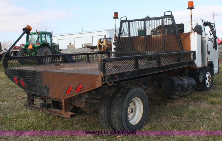 image for item A6612 1998 Isuzu NPR flatbed truck