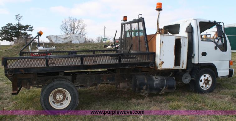 image for item A6612 1998 Isuzu NPR flatbed truck