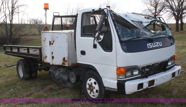 image for item A6612 1998 Isuzu NPR flatbed truck