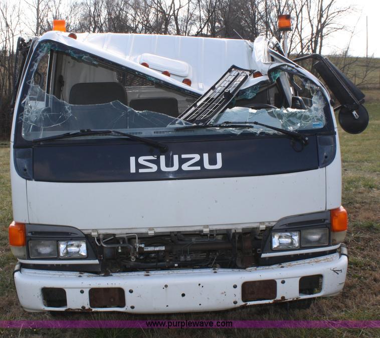 image for item A6612 1998 Isuzu NPR flatbed truck