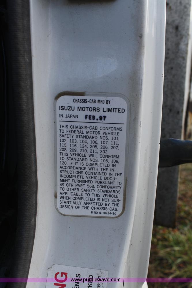 image for item A6612 1998 Isuzu NPR flatbed truck