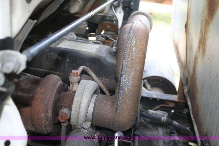 image for item A6612 1998 Isuzu NPR flatbed truck