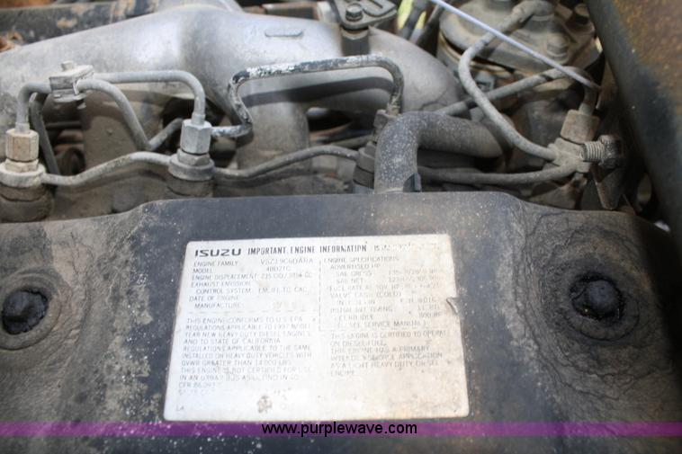 image for item A6612 1998 Isuzu NPR flatbed truck