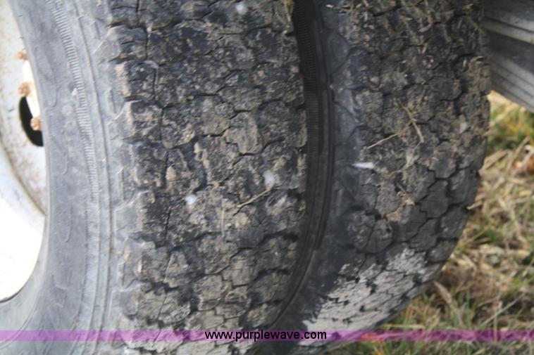 image for item A6612 1998 Isuzu NPR flatbed truck