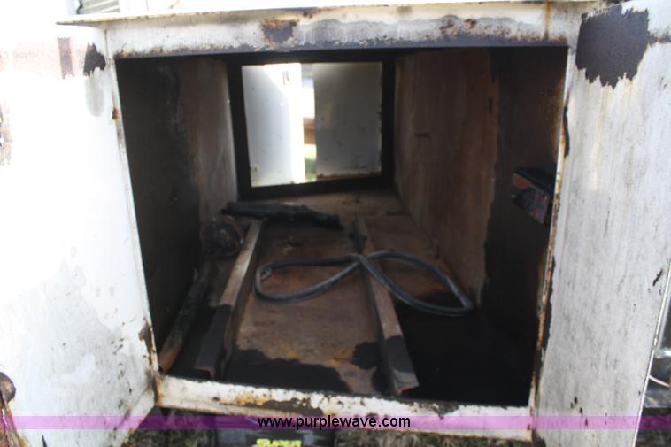 image for item A6612 1998 Isuzu NPR flatbed truck