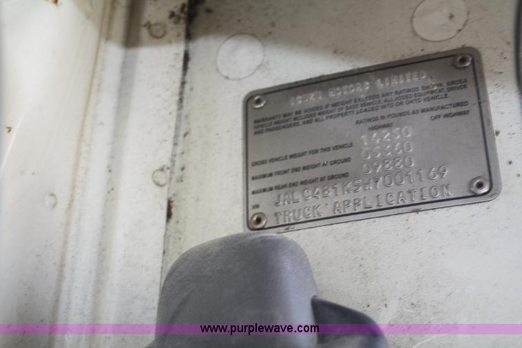 image for item A6612 1998 Isuzu NPR flatbed truck