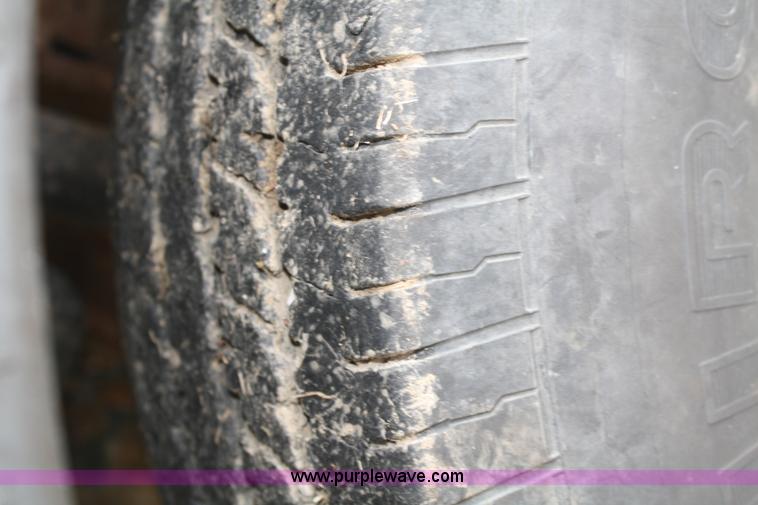 image for item A6612 1998 Isuzu NPR flatbed truck