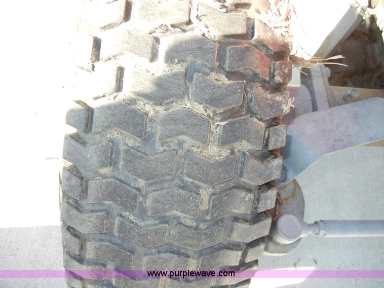 image for item H9172 Kubota B2400 tractor with mower