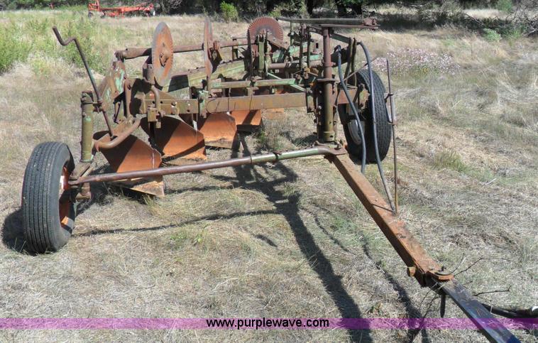 image for item A1738 Oliver seven bottom plow