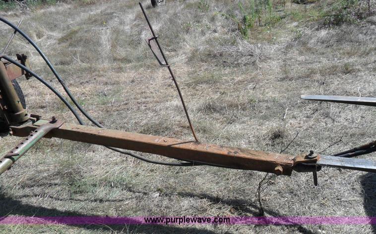 image for item A1738 Oliver seven bottom plow
