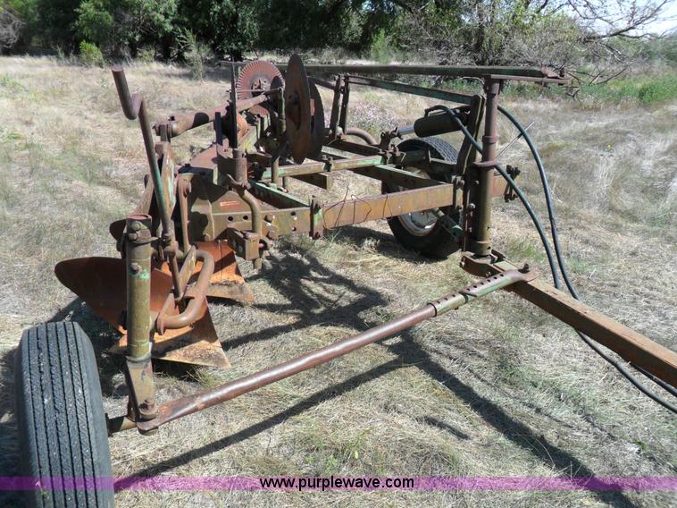 image for item A1738 Oliver seven bottom plow