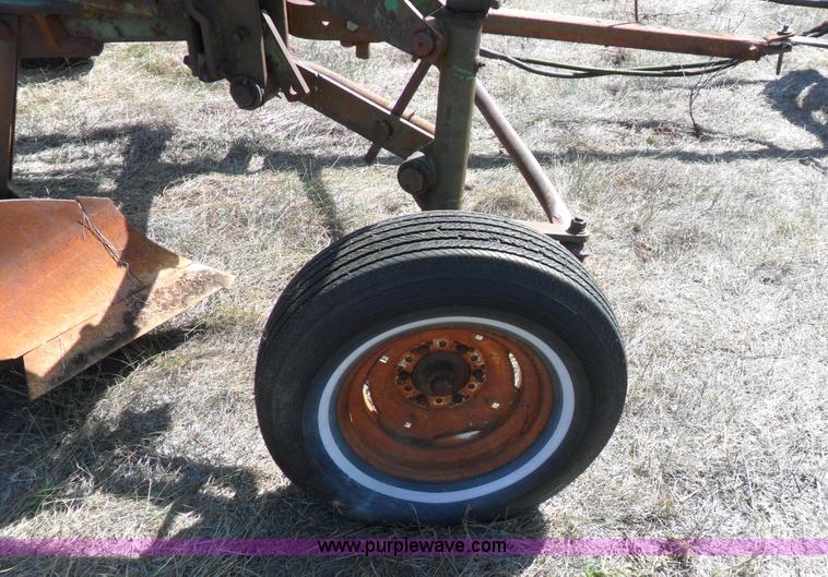 image for item A1738 Oliver seven bottom plow