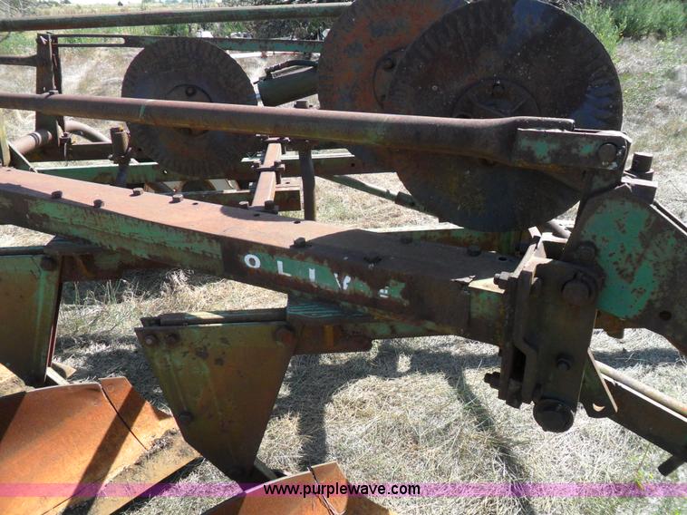 image for item A1738 Oliver seven bottom plow