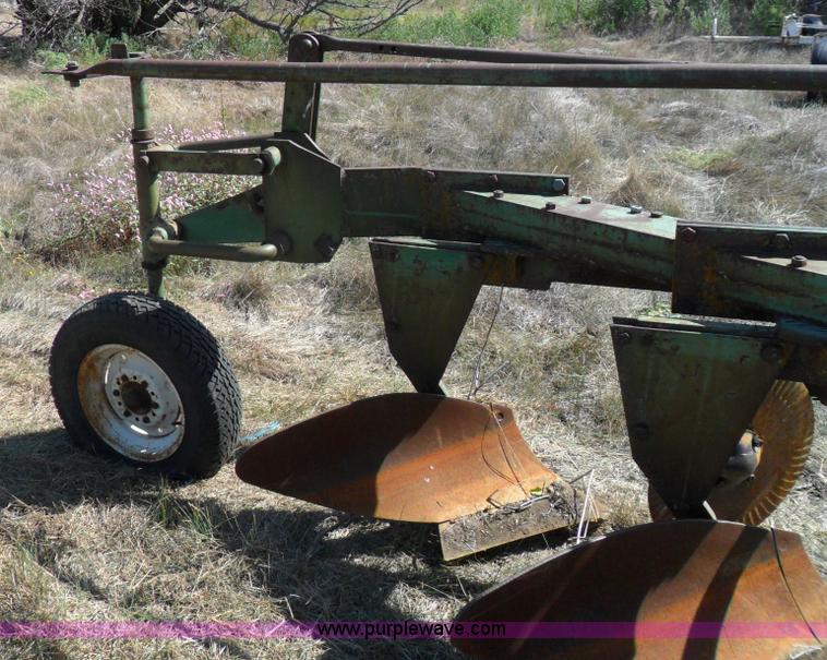 image for item A1738 Oliver seven bottom plow