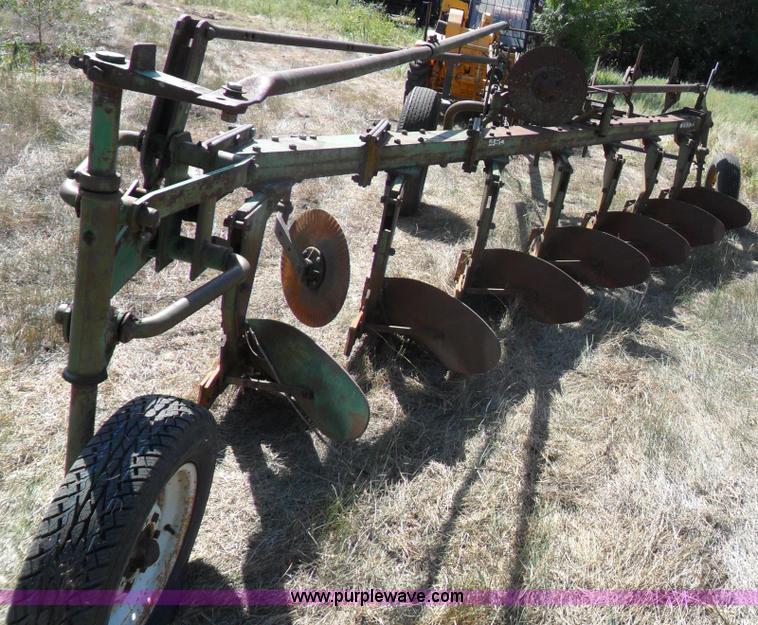image for item A1738 Oliver seven bottom plow