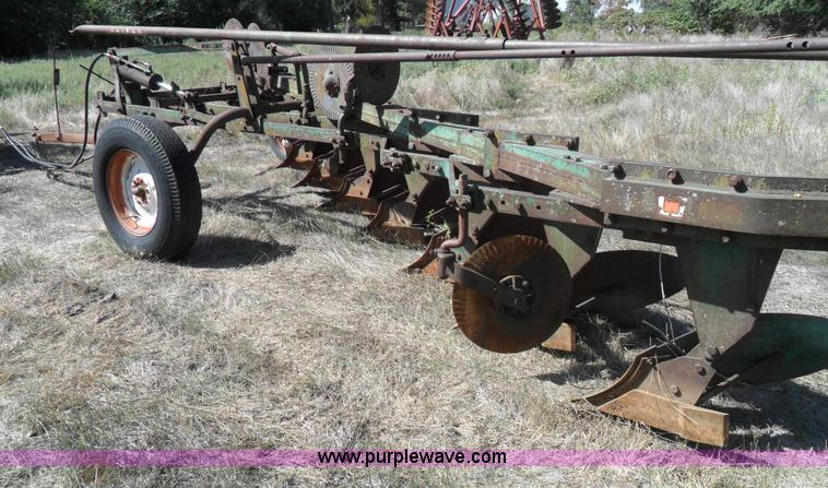 image for item A1738 Oliver seven bottom plow