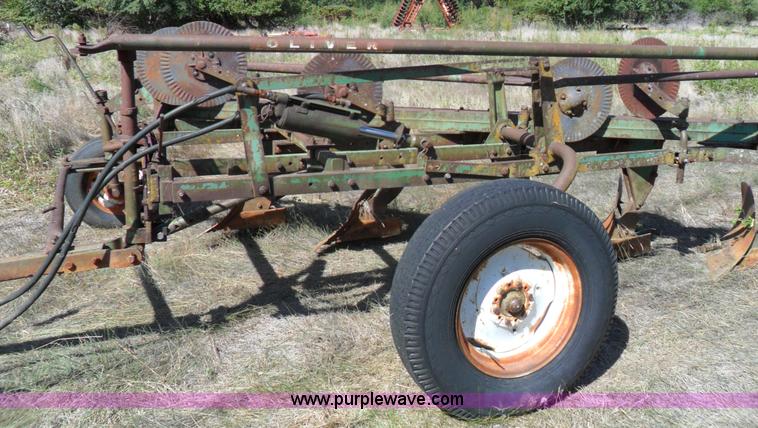 image for item A1738 Oliver seven bottom plow