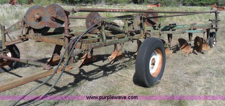 image for item A1738 Oliver seven bottom plow
