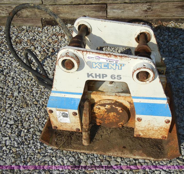 image for item H9241 Kent KHP65 hydraulic packer backhoe attachment