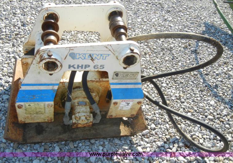 image for item H9241 Kent KHP65 hydraulic packer backhoe attachment