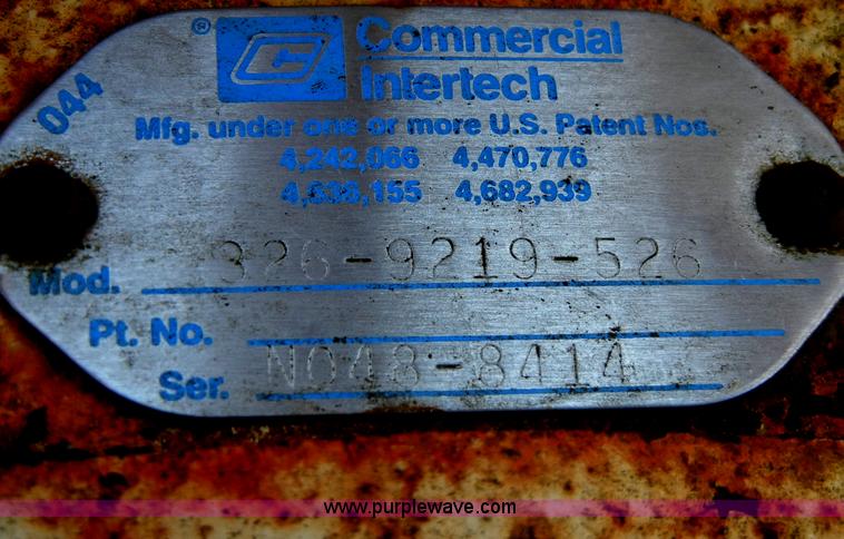 image for item H9241 Kent KHP65 hydraulic packer backhoe attachment