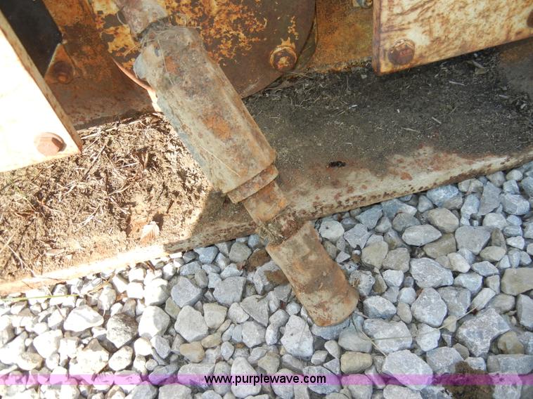 image for item H9241 Kent KHP65 hydraulic packer backhoe attachment