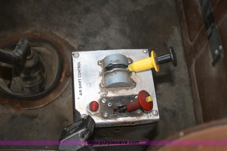 image for item A6615 1988 White WIM semi truck