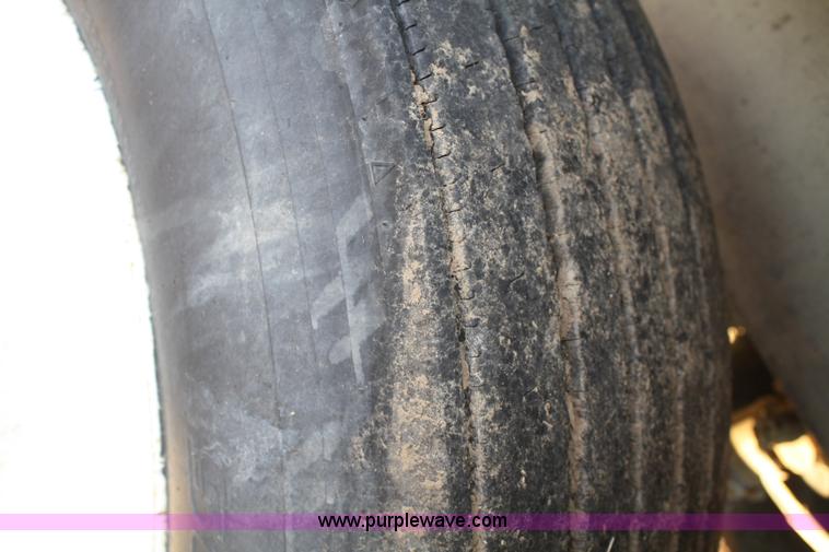 image for item A6615 1988 White WIM semi truck