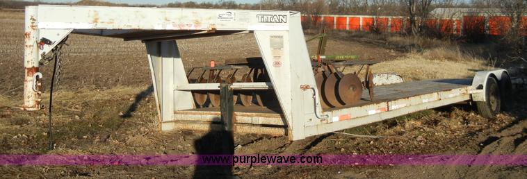 image for item A3383 2000 Titan 30' flatbed gooseneck trailer