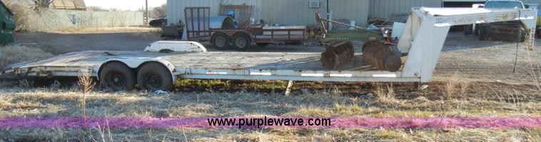 image for item A3383 2000 Titan 30' flatbed gooseneck trailer