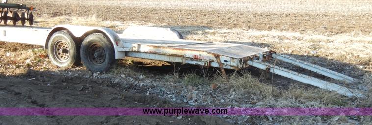 image for item A3383 2000 Titan 30' flatbed gooseneck trailer